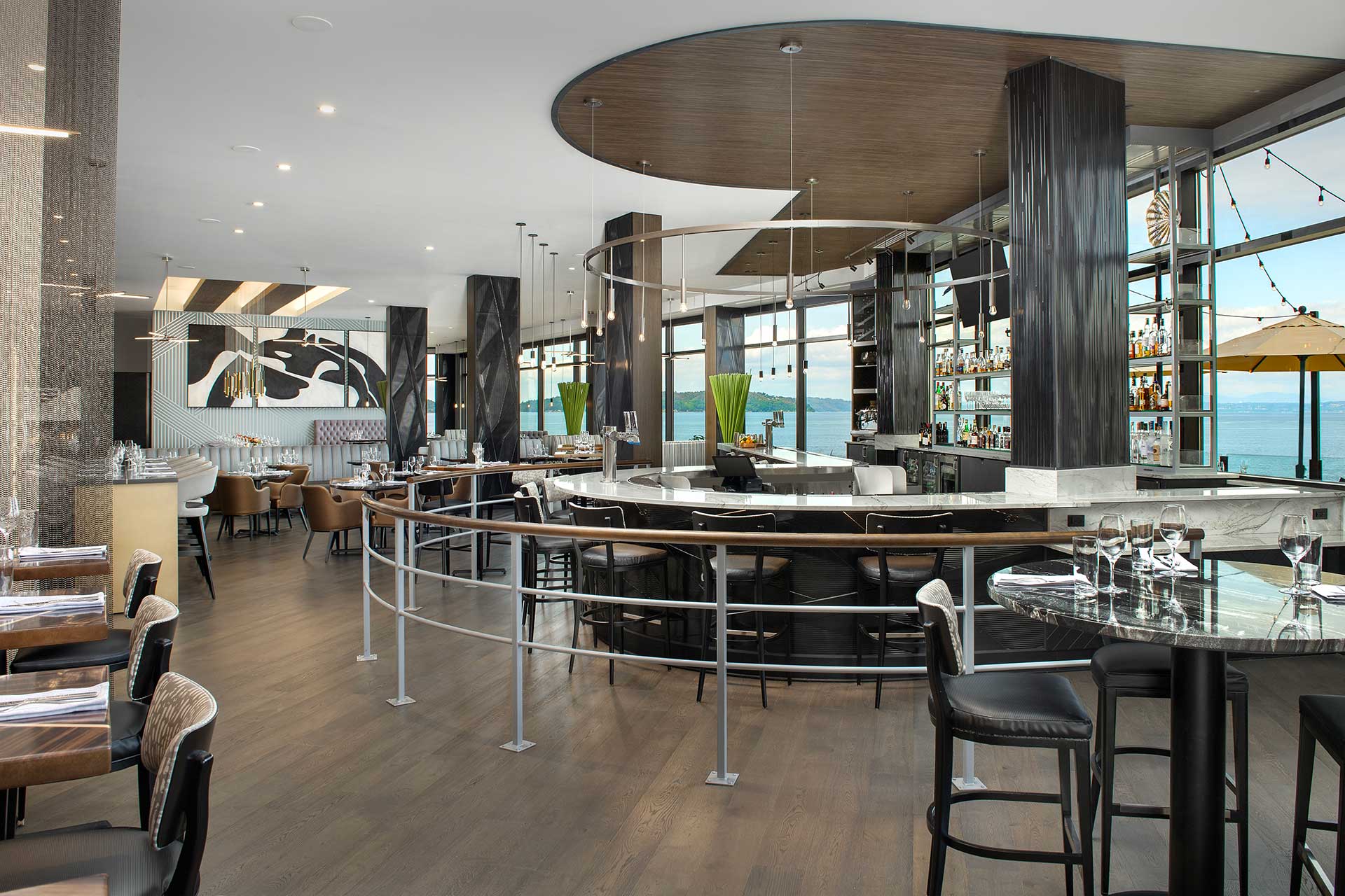 Main dining room and bar with a view of the water at Copper and Salt Northwest Kitchen.